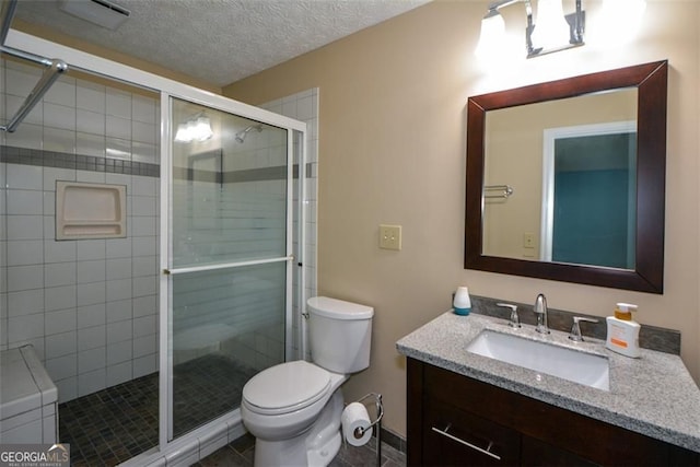 4766 Jamerson Forest Cir, Marietta, GA 30066 - bathroom featuring vanity, a stall shower, and a textured ceiling