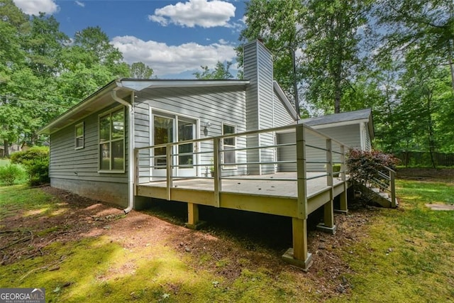 4766 Jamerson Forest Cir, Marietta, GA 30066 - rear view of house with a wooden deck and a chimney