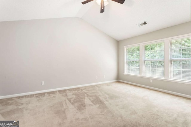 144 Nocatee Trl, Woodstock, GA 30188 - carpeted spare room with a ceiling fan and lofted ceiling