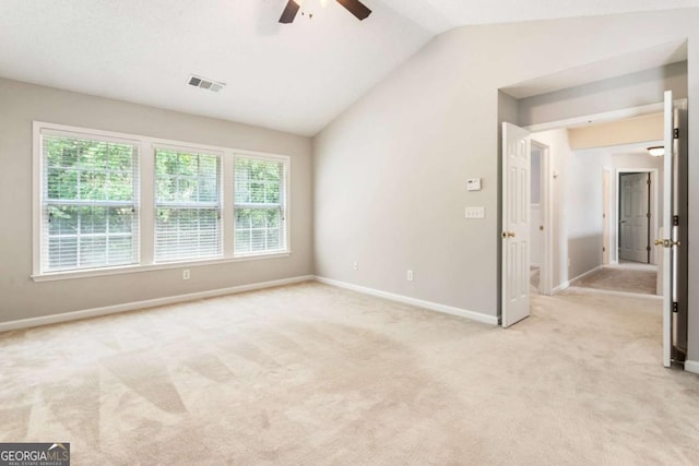 144 Nocatee Trl, Woodstock, GA 30188 - empty room featuring a ceiling fan, light carpet, and lofted ceiling