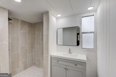 2526 Bald Eagle Trl, Gainesville, GA 30507 - full bathroom featuring vanity, tiled shower, and recessed lighting