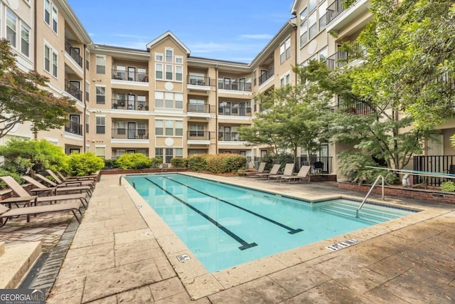 1850 Cotillion Dr Unit 3123, Atlanta, GA 30338 - community pool with a patio