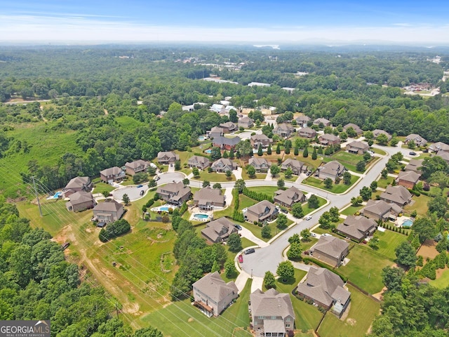 466 Sweet Apple, Buford, GA 30518 - aerial view of property and surrounding area with nearby suburban area and a heavily wooded area