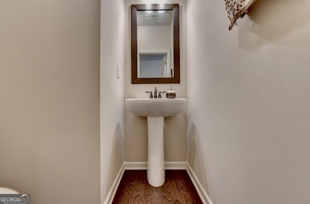 5016 Garrett Ct, Alpharetta, GA 30005 - bathroom featuring wood finished floors and baseboards