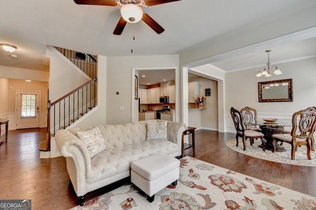 5016 Garrett Ct, Alpharetta, GA 30005 - living room with stairway, ceiling fan, dark wood-style flooring, and a chandelier