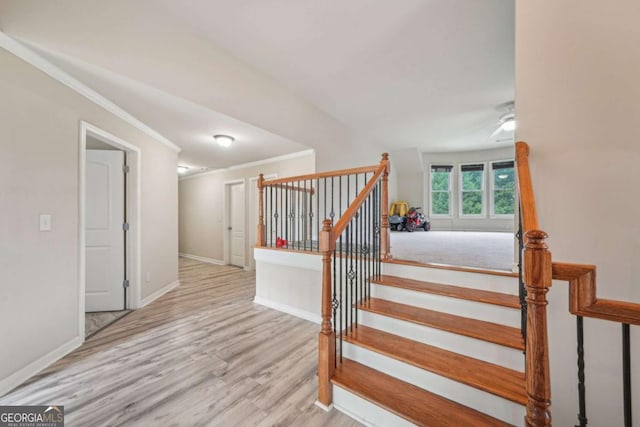 1979 Alcovy Shoals Blf, Lawrenceville, GA 30045 - stairs featuring ceiling fan, wood finished floors, and ornamental molding