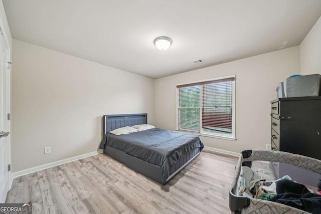 1979 Alcovy Shoals Blf, Lawrenceville, GA 30045 - bedroom featuring wood finished floors and baseboards