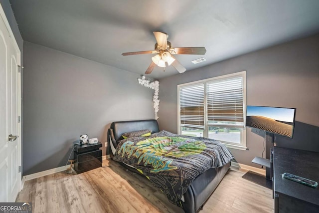 1979 Alcovy Shoals Blf, Lawrenceville, GA 30045 - bedroom featuring wood finished floors and a ceiling fan