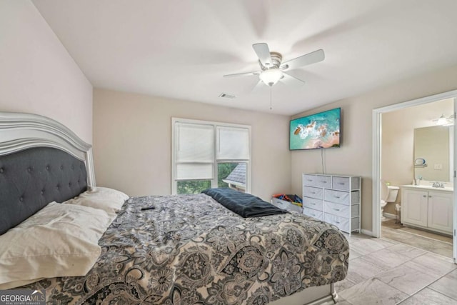 1979 Alcovy Shoals Blf, Lawrenceville, GA 30045 - bedroom with ensuite bath and a ceiling fan