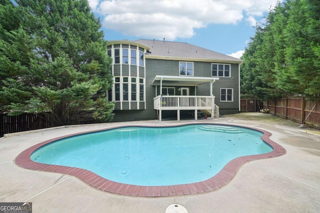 1979 Alcovy Shoals Blf, Lawrenceville, GA 30045 - view of pool featuring a fenced backyard, a patio area, and a wooden deck