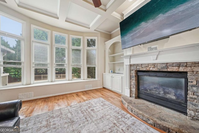 1979 Alcovy Shoals Blf, Lawrenceville, GA 30045 - unfurnished living room with wood finished floors, a fireplace, coffered ceiling, beam ceiling, and ornamental molding