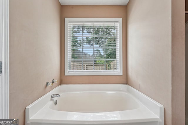 1415 Langdon Park Ct, Winder, GA 30680 - full bathroom featuring a garden tub