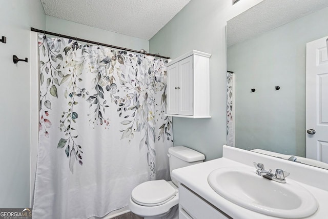 1415 Langdon Park Ct, Winder, GA 30680 - bathroom with a textured ceiling, vanity, and a shower with shower curtain