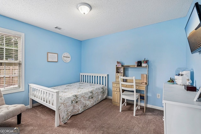 1415 Langdon Park Ct, Winder, GA 30680 - bedroom with carpet floors and a textured ceiling