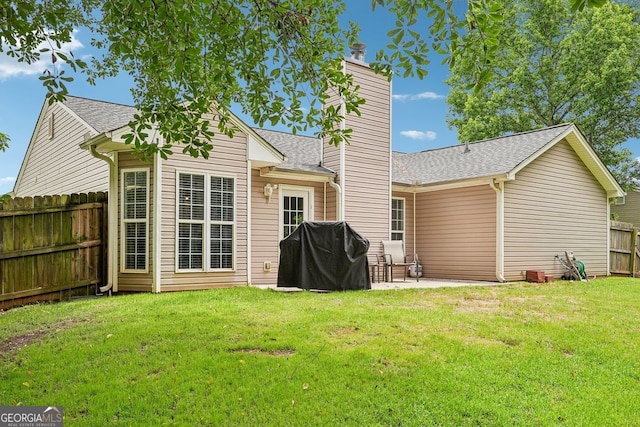 1415 Langdon Park Ct, Winder, GA 30680 - rear view of property featuring a chimney, roof with shingles, and a patio area