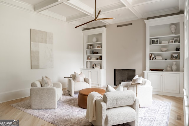 900 Crabapple Hl, Milton, GA 30004 - living area with coffered ceiling, beam ceiling, light wood-type flooring, ornamental molding, and baseboards