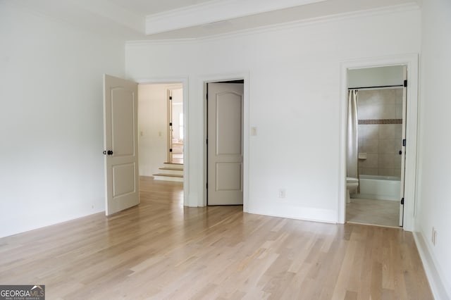 900 Crabapple Hl, Milton, GA 30004 - unfurnished bedroom with light wood-style flooring, crown molding, baseboards, and ensuite bathroom