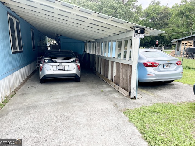36 Ocean View St, Woodbine, GA 31569 - view of car parking with a carport and driveway