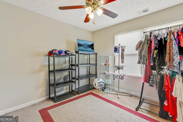 12303 Waldrop Pl, Decatur, GA 30034 - carpeted bedroom with baseboards, a textured ceiling, and ceiling fan