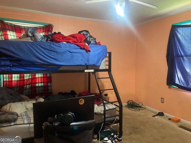 2722 Alden St, Macon, GA 31206 - carpeted bedroom with ornamental molding, baseboards, and ceiling fan