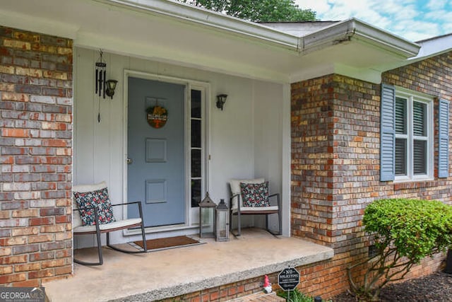 120 Chambers Ave, Cornelia, GA 30531 - property entrance featuring brick siding and a porch