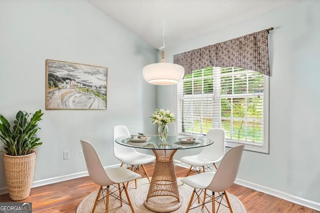507 Hunterian Pl, Newnan, GA 30265 - dining room with wood finished floors, baseboards, and vaulted ceiling