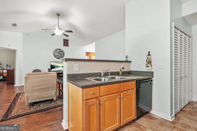 507 Hunterian Pl, Newnan, GA 30265 - kitchen with black dishwasher, a sink, dark countertops, a ceiling fan, and tasteful backsplash