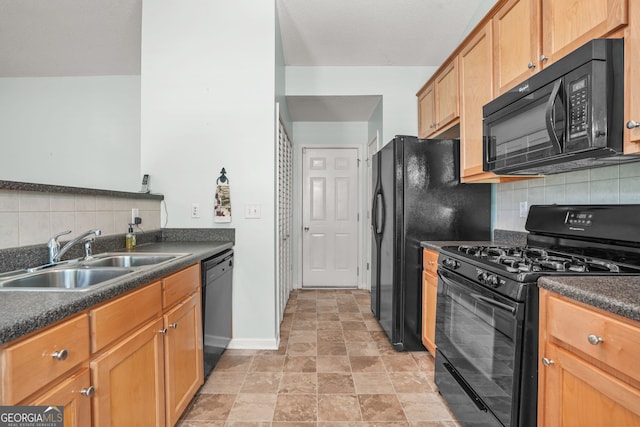 507 Hunterian Pl, Newnan, GA 30265 - kitchen with black appliances, a sink, dark countertops, backsplash, and baseboards