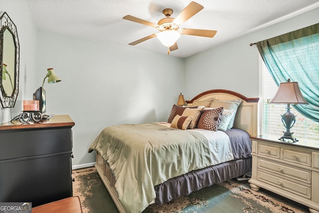 507 Hunterian Pl, Newnan, GA 30265 - carpeted bedroom featuring a textured ceiling and ceiling fan