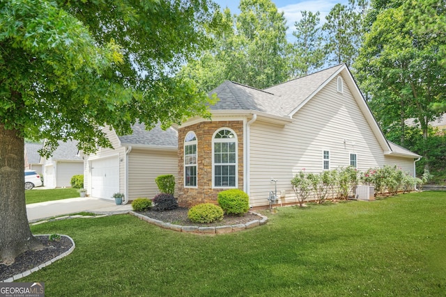507 Hunterian Pl, Newnan, GA 30265 - view of front facade featuring a shingled roof, a front lawn, concrete driveway, and a garage