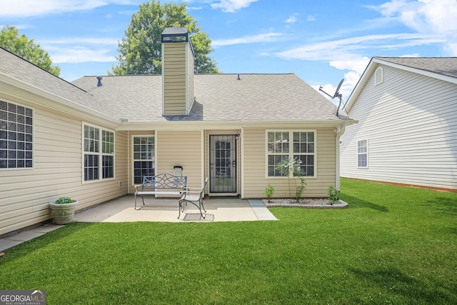 507 Hunterian Pl, Newnan, GA 30265 - back of property with a patio, a yard, a chimney, and a shingled roof