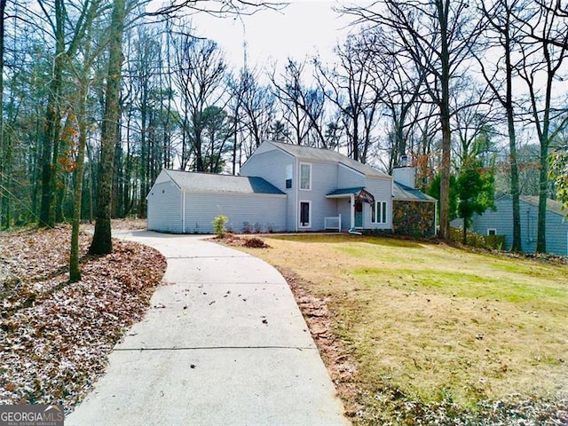 5419 Lake Dr, Douglasville, GA 30135 - view of front of house featuring driveway and a front lawn