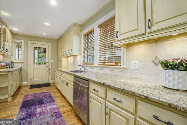 1821 N Rock Springs Rd NE, Atlanta, GA 30324 - kitchen featuring stainless steel dishwasher, crown molding, light stone counters, light wood finished floors, and recessed lighting