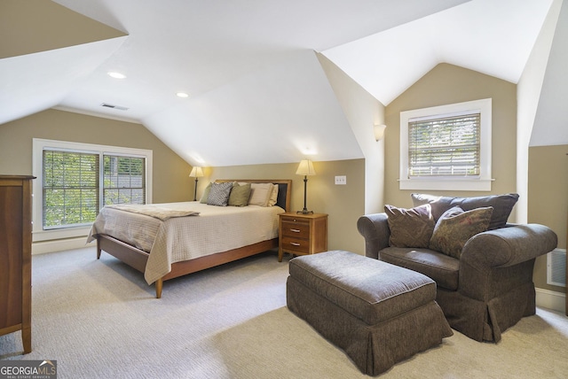 1821 N Rock Springs Rd NE, Atlanta, GA 30324 - bedroom with vaulted ceiling, multiple windows, and light carpet