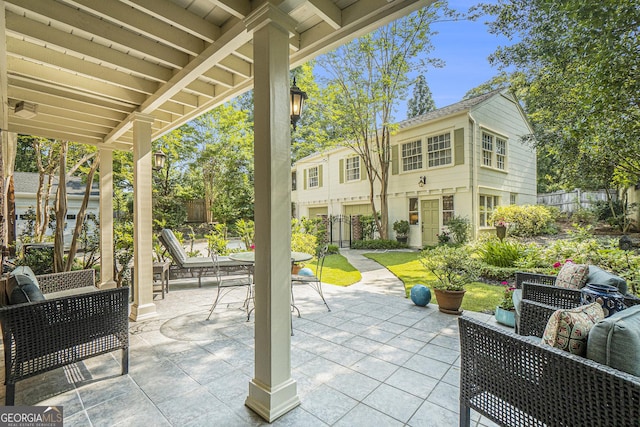 1821 N Rock Springs Rd NE, Atlanta, GA 30324 - fenced backyard featuring outdoor dining space and a patio