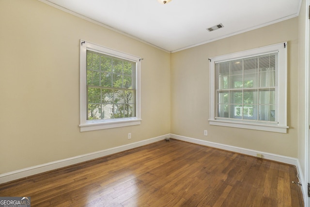 1821 N Rock Springs Rd NE, Atlanta, GA 30324 - spare room with crown molding and wood finished floors