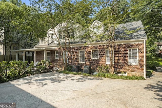 1821 N Rock Springs Rd NE, Atlanta, GA 30324 - view of front of house featuring brick siding and a balcony