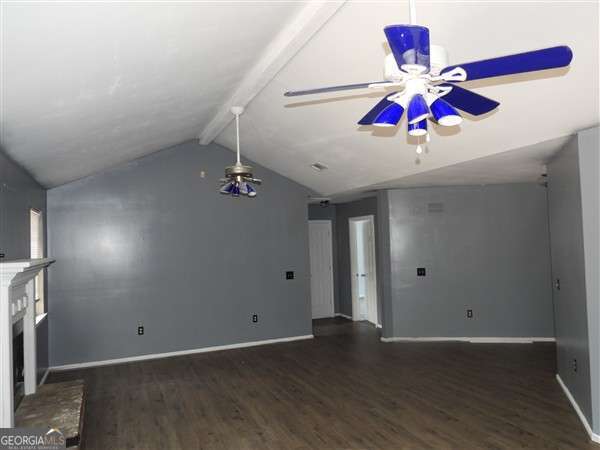 2324 Suttle Ct, Hinesville, GA 31313 - unfurnished living room featuring wood finished floors, baseboards, and ceiling fan