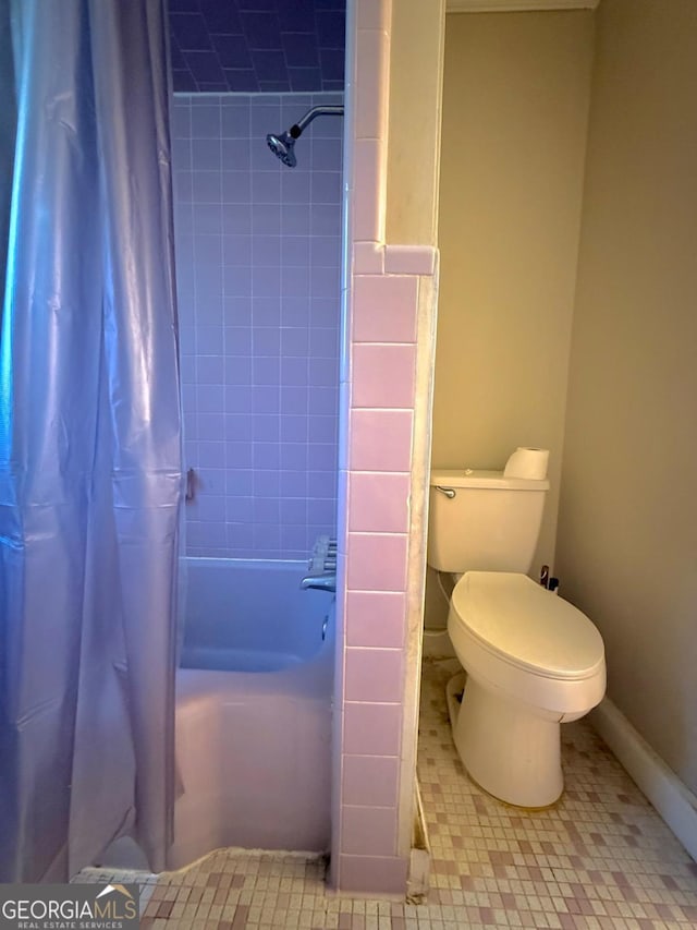 44 Kersey St, Hazlehurst, GA 31539 - full bath with shower / bath combo with shower curtain and tile patterned flooring