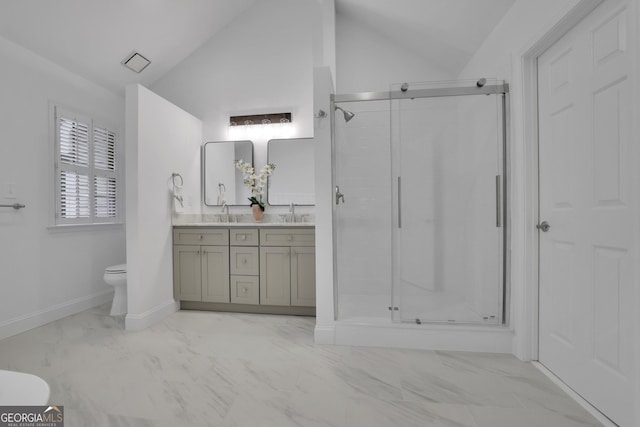 305 River Glen Dr, Roswell, GA 30075 - full bathroom featuring toilet, marble finish floors, lofted ceiling, double vanity, and a stall shower
