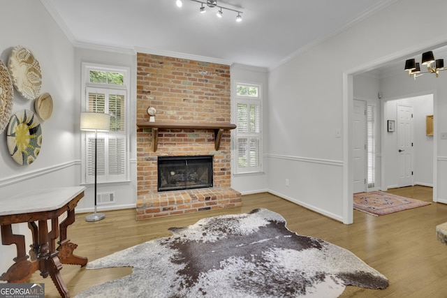 305 River Glen Dr, Roswell, GA 30075 - living room with wood finished floors, ornamental molding, a fireplace, and baseboards