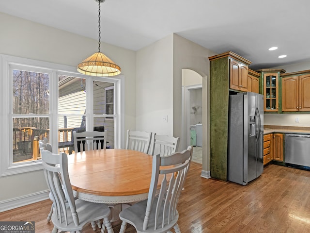 353 Wentworth Way, Griffin, GA 30224 - dining space featuring light wood-style flooring, recessed lighting, and arched walkways