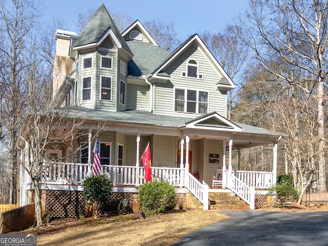 353 Wentworth Way, Griffin, GA 30224 - victorian home with covered porch, a chimney, and roof with shingles
