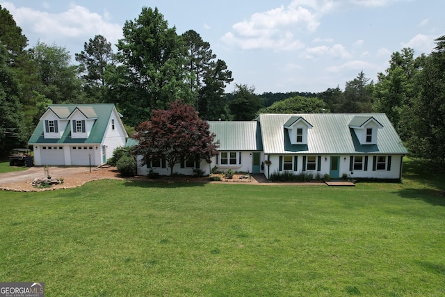 2048 Swint Rd, Griffin, GA 30224 - new england style home featuring driveway, metal roof, and a front lawn