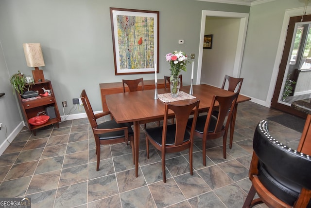 2048 Swint Rd, Griffin, GA 30224 - dining space featuring baseboards and crown molding