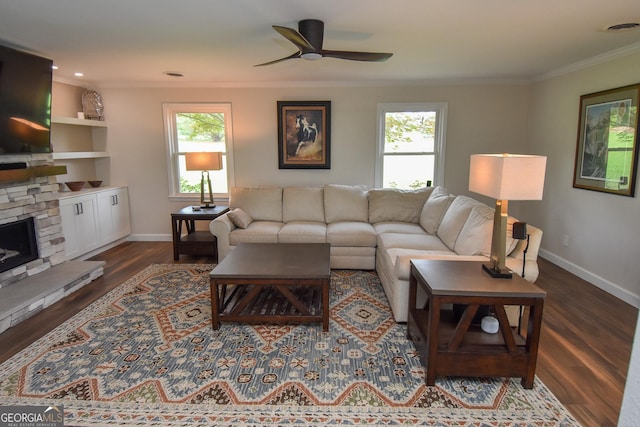 2048 Swint Rd, Griffin, GA 30224 - living room with healthy amount of natural light, ornamental molding, baseboards, wood finished floors, and ceiling fan