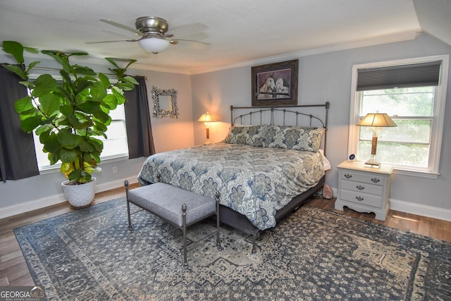 2048 Swint Rd, Griffin, GA 30224 - bedroom featuring wood finished floors, baseboards, ornamental molding, and a ceiling fan