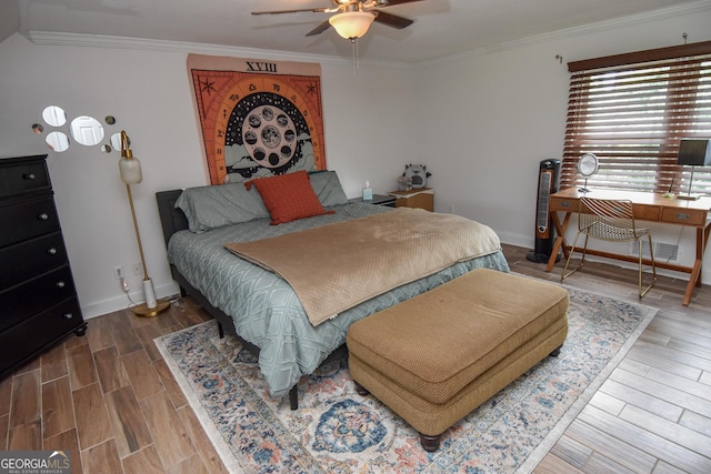 2048 Swint Rd, Griffin, GA 30224 - bedroom featuring wood finished floors, ornamental molding, baseboards, and a ceiling fan