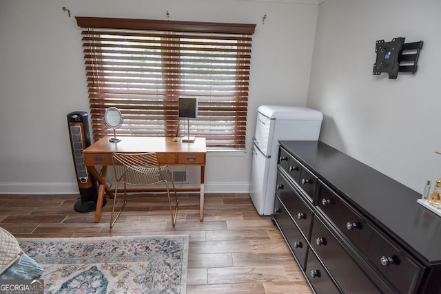 2048 Swint Rd, Griffin, GA 30224 - home office featuring baseboards and light wood-style floors