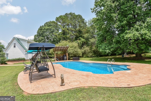 2048 Swint Rd, Griffin, GA 30224 - swimming pool with a lawn and a patio